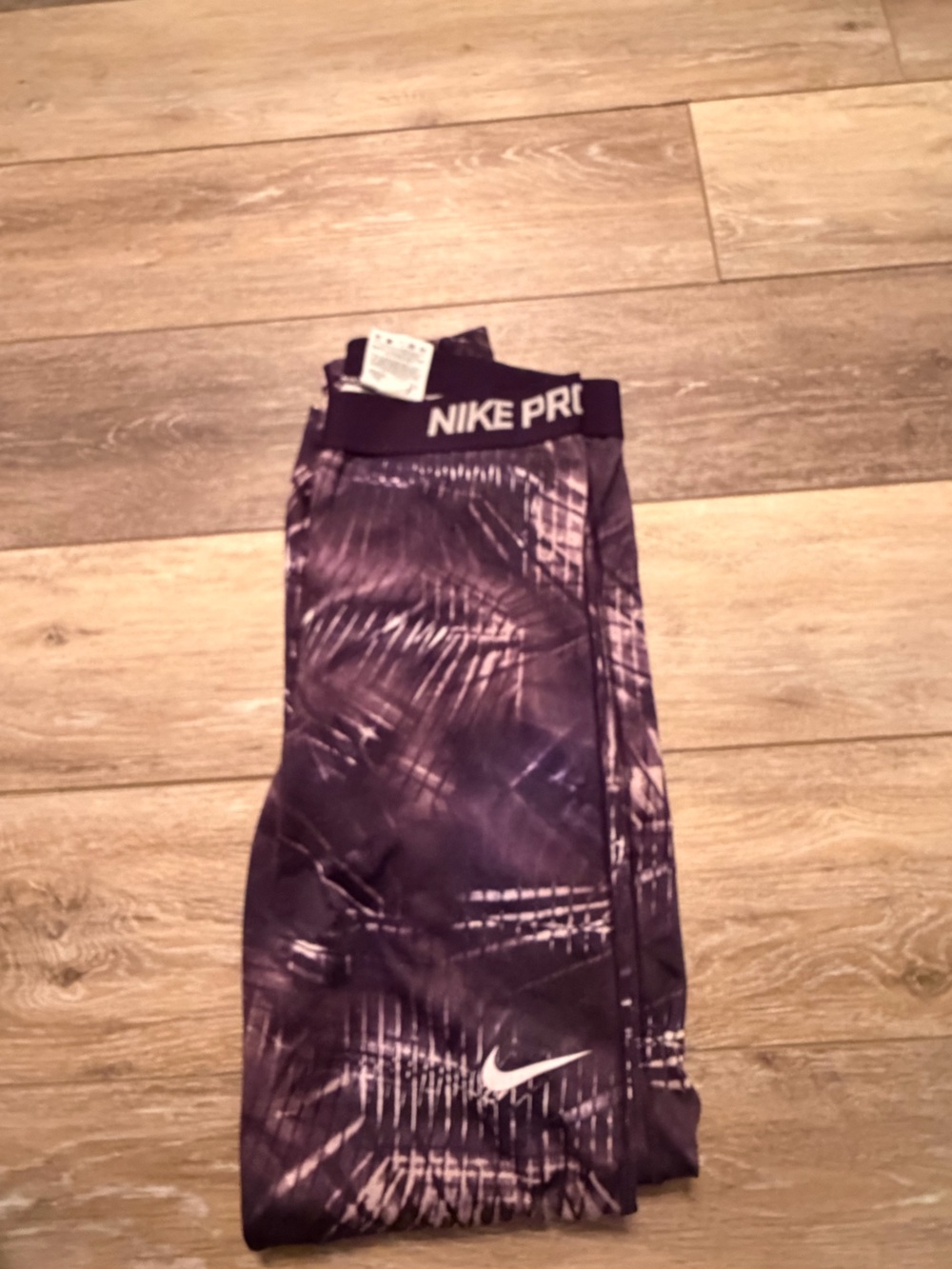 Nike Pro women’s purple compression leggings